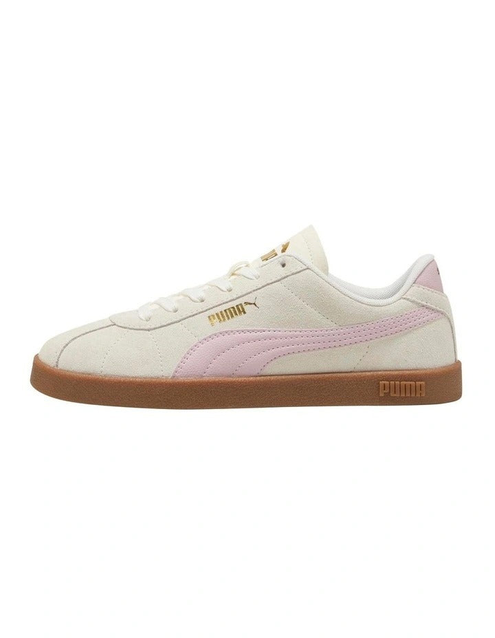 White sneaker with pink swoosh logo on a white background