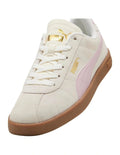 White sneaker with pink accents and a gold logo on a white background