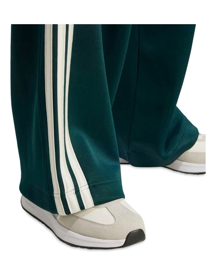 Adidas Stadium 3-Stripes Track Tracksuit Bottoms in black with satin piping and signature 3-stripes down the sides