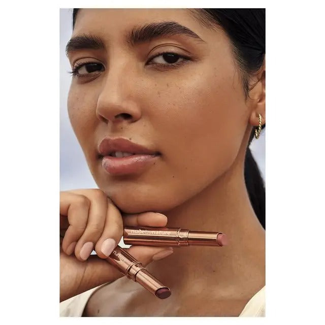 Nude By Nature Cherry Tinted Lip Butter – hydrating glossy lip tint.